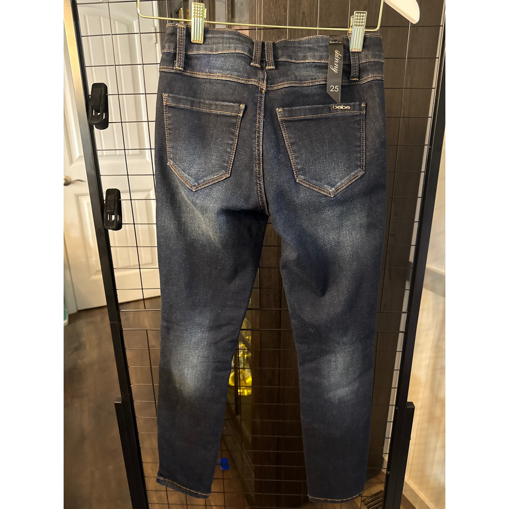 bebe Distressed Dark Wash Denim Jeans in Blue - Picture 2 of 3